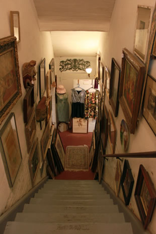 Attenson's Antiques & Books framed art and vintage clothes